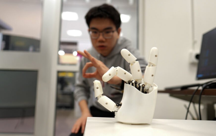 Wristband enables wearers to control a robotic hand with their own movements